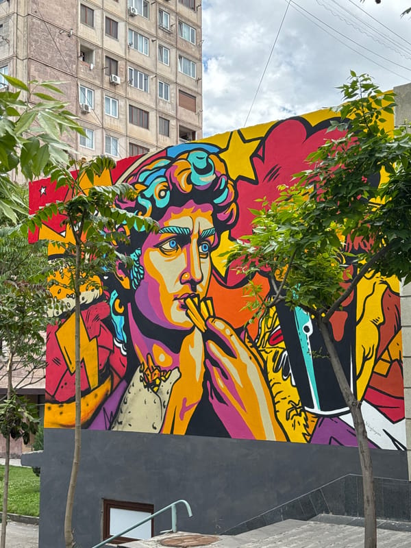 Vibrant smoking portrait mural spotted on Yerevan building