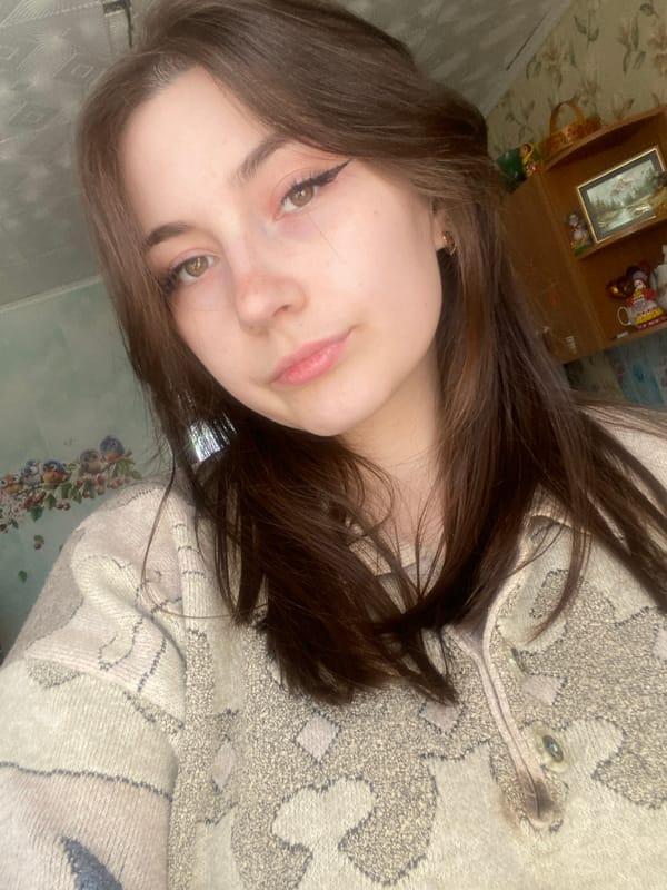 Woman takes morning selfies with cat in Sosnovo, Russia