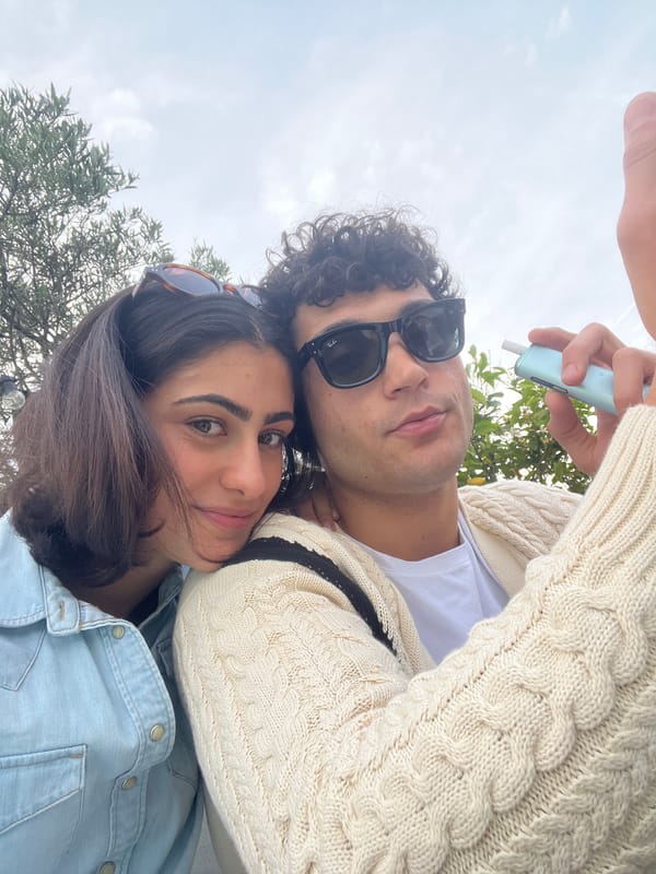 Young couple enjoys rooftop terrace time in Milan