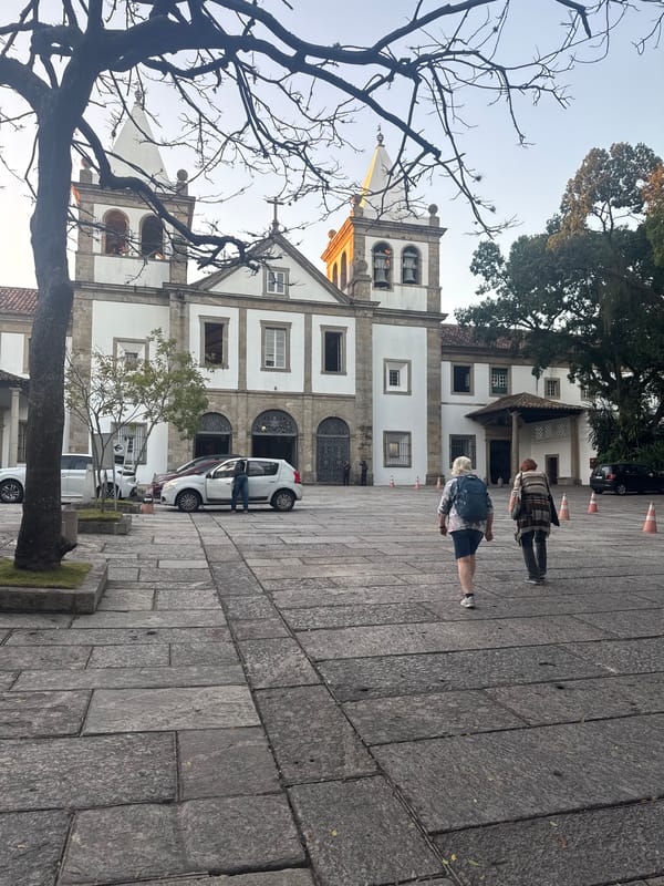 Historic church plaza in Rio, statues and old trees