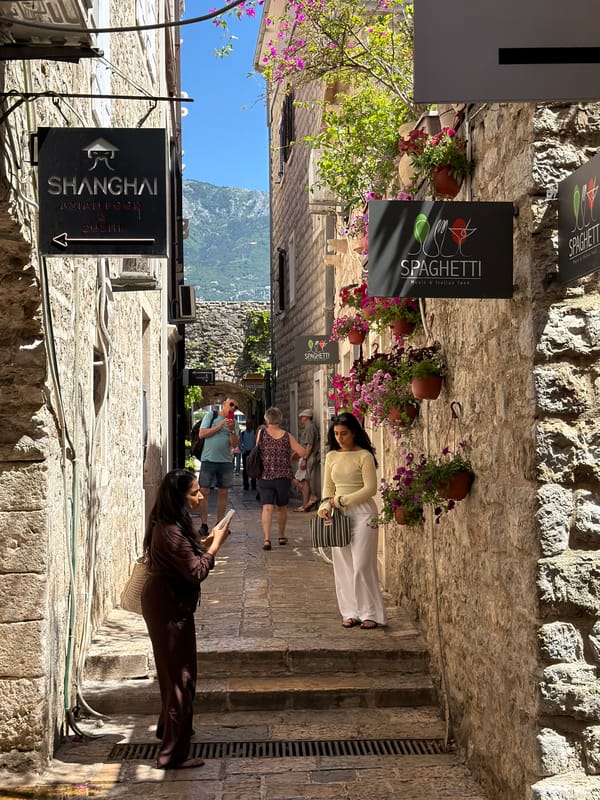Morning street life documented in historic Budva, Montenegro