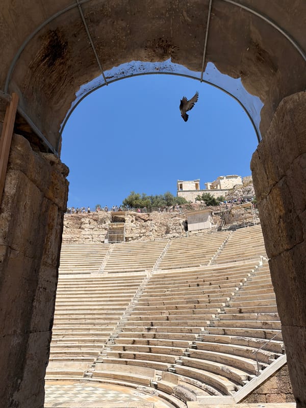 Tourist takes playful selfie at ancient Athens archaeological site
