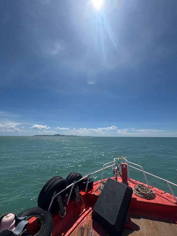 Morning boat excursion captures smiling passengers off Pattaya coast