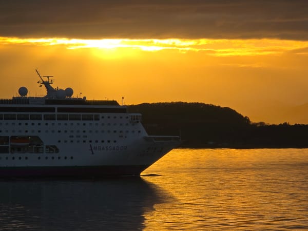 Cruise ship Ambassador sails past Randaberg during dramatic sunset