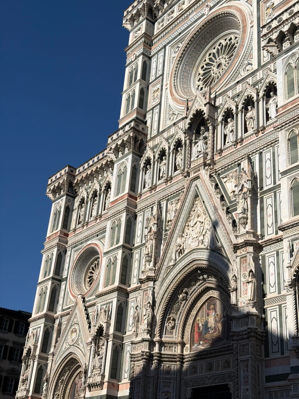 Tourist documents Florence Cathedral complex from multiple angles
