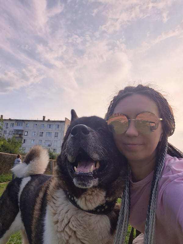 Outdoor selfie set with a dog, paired with branded orange slides