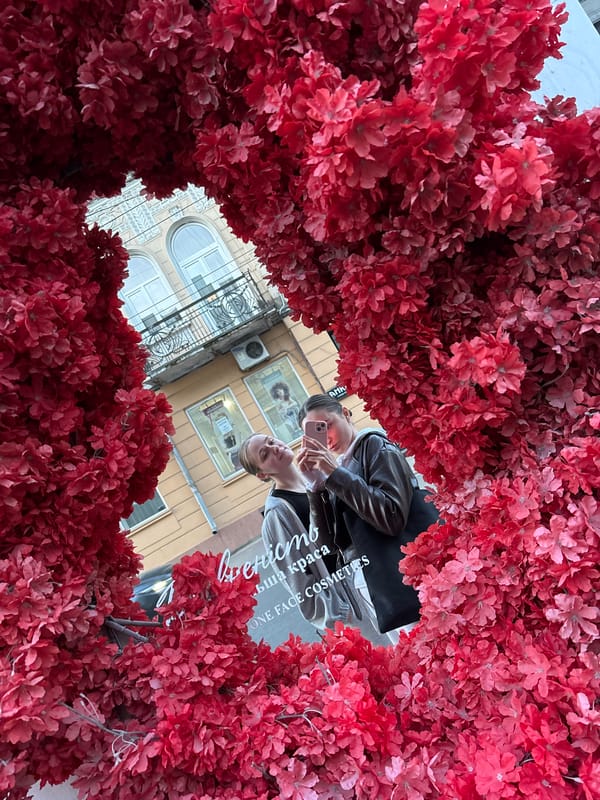 Woman takes selfie during sunset in Ternopil, Ukraine