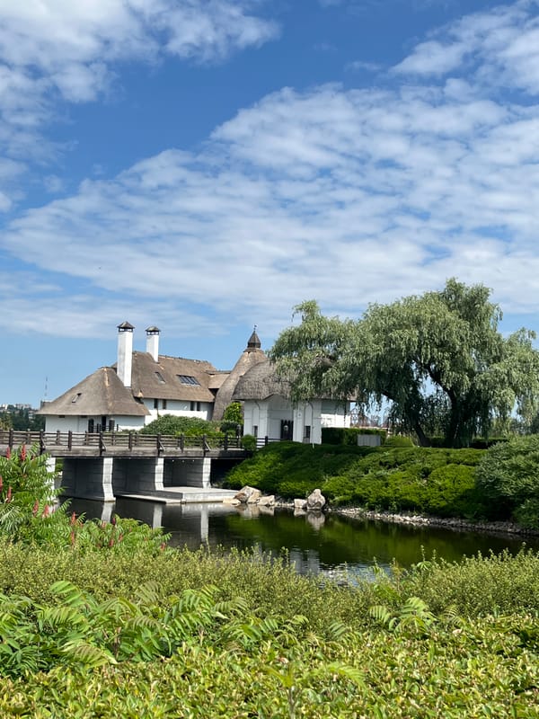 Morning stroll through Dnipro Botanical Garden's grounds and thatched landmark
