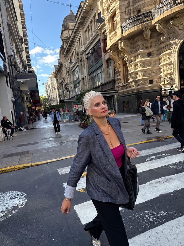 Woman in business attire observed on Buenos Aires crosswalk