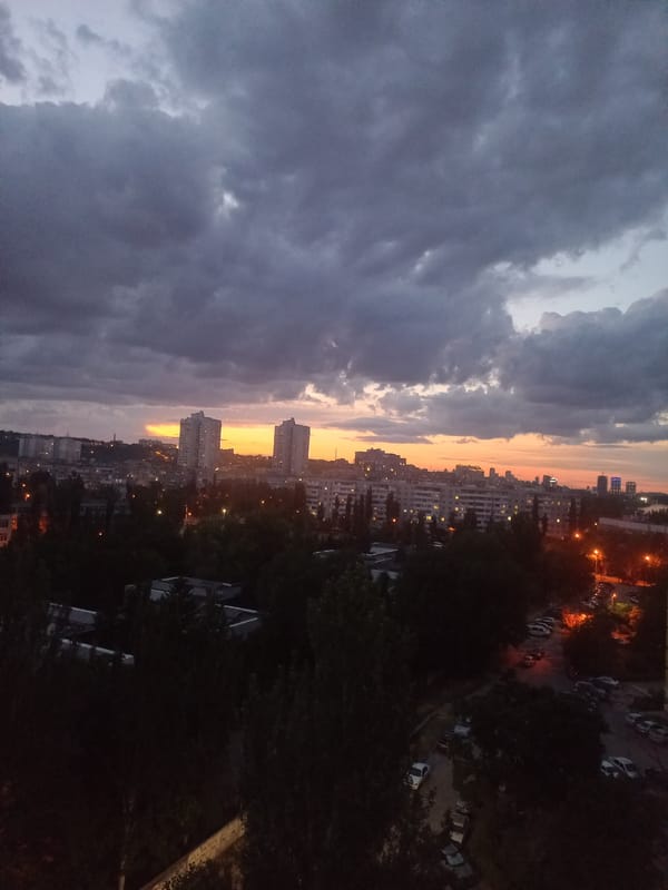 Dnipro at golden hour, parks and skyline under summer skies