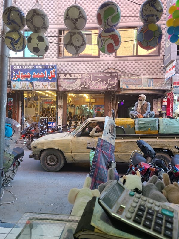 Urban street scene documented in South Asian commercial district