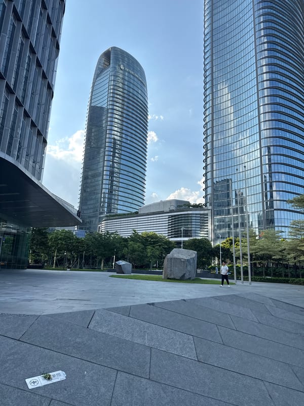 Morning street life around Haizhu District's modern waterfront core