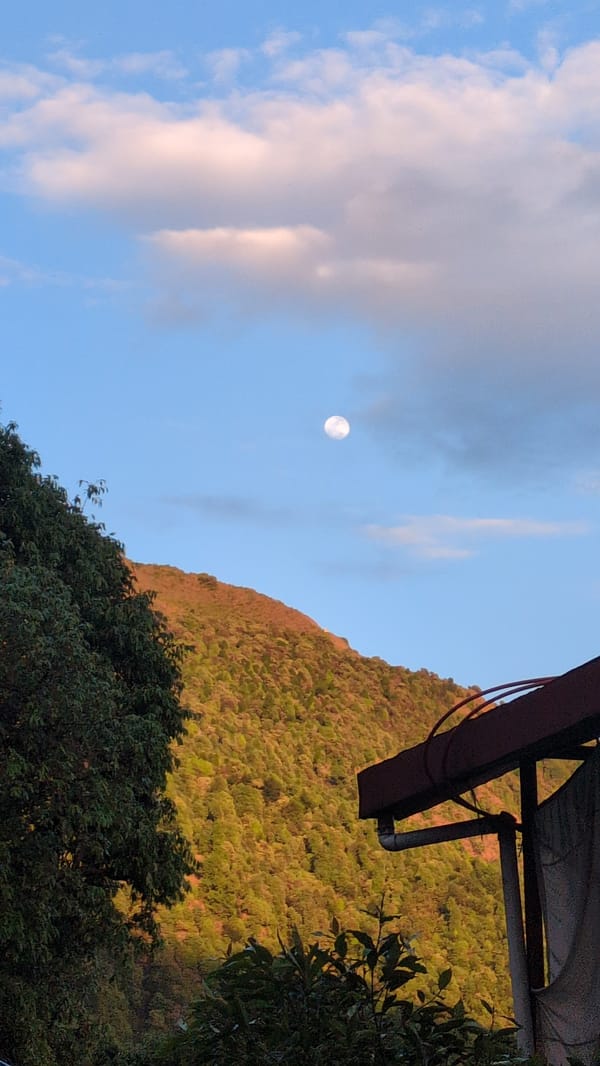 Hillside village of Haini documented in panoramic mountain views