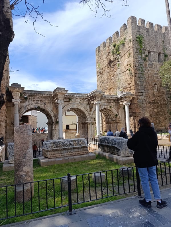 Tourist enjoys ice cream amid coastal scenes in Antalya