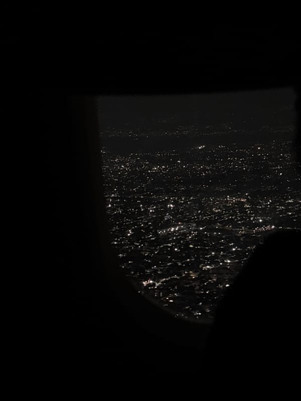 Nighttime urban scenes: rainy window view and underground tunnel documented