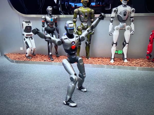 Robots and luxury cars displayed at unknown exhibition venue