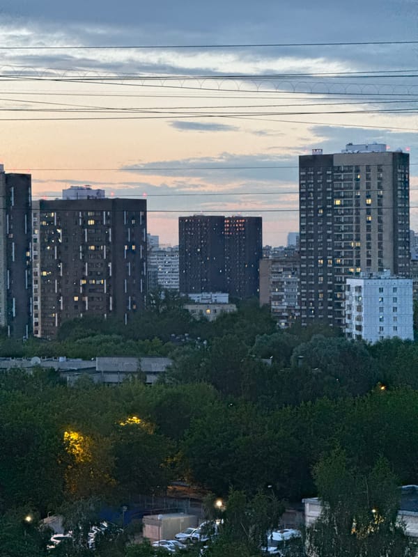 Dusk over Khimki: apartment blocks, the Skhodnya River, and ice cream