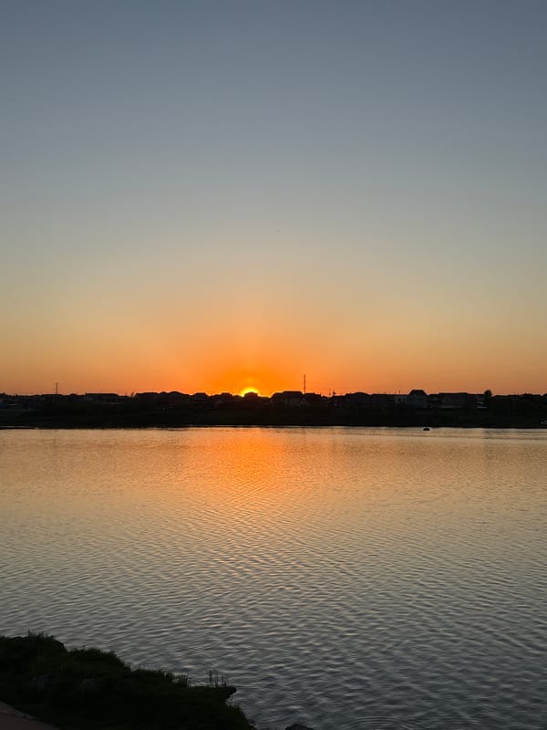 Sunset observed over water body in Krasnoyarsk, Russia