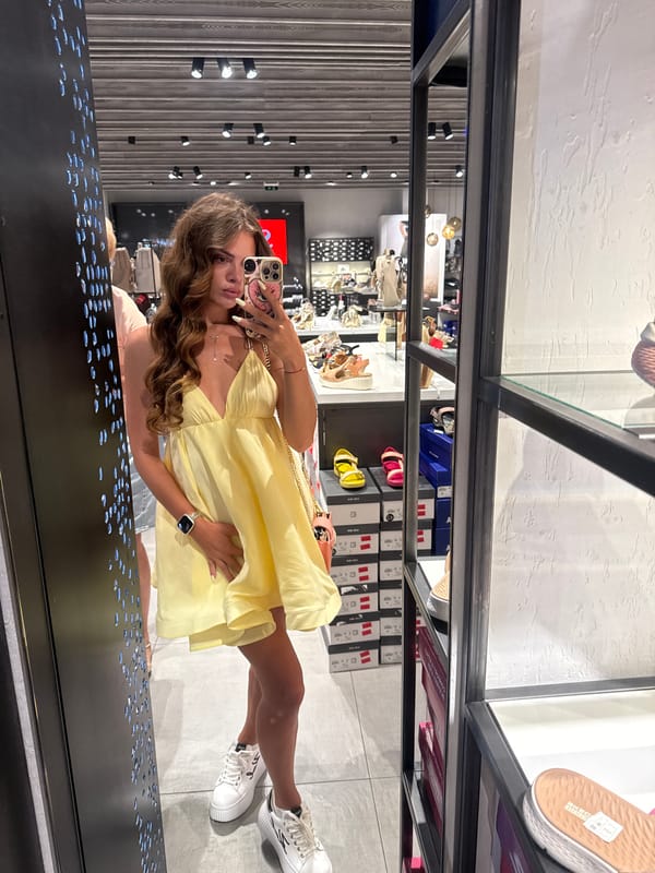 Mirror selfie in a Plovdiv shoe store, yellow dress and platforms
