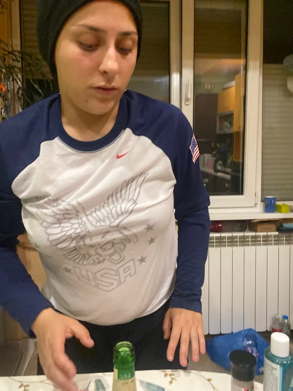 Woman in USA eagle shirt spotted indoors Sofia