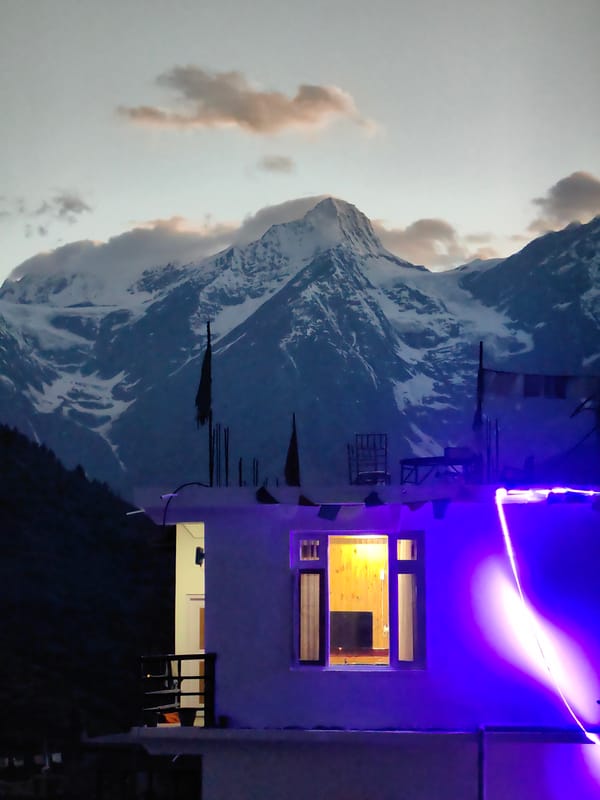 Keylong at dusk: mountain scenery, sheep on the road, valley life
