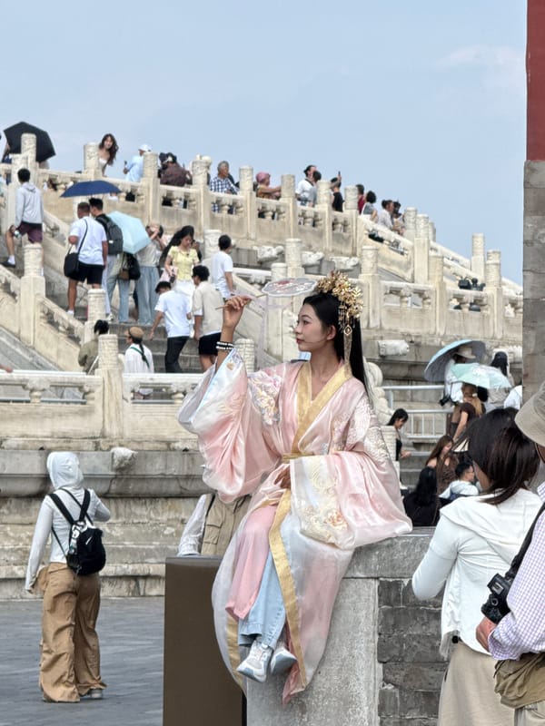 Traditional Chinese attire scene in Beijing's Dongcheng District