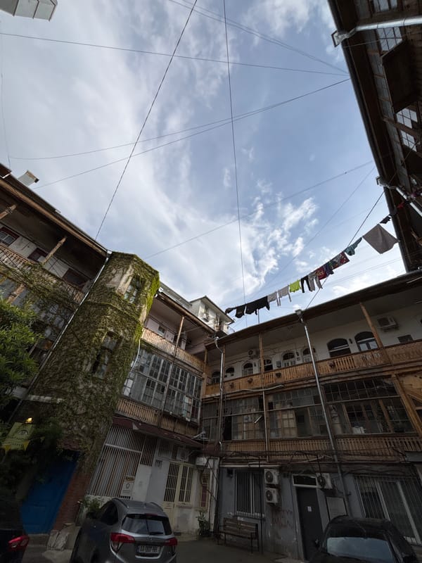 Urban courtyard view captured in old Tbilisi neighborhood