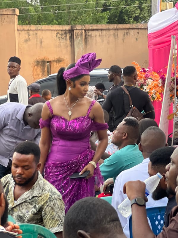Outdoor wedding ceremony draws crowd in urban setting