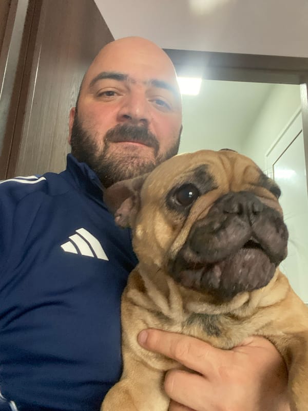 Man with dog photographed in Sofia, Bulgaria