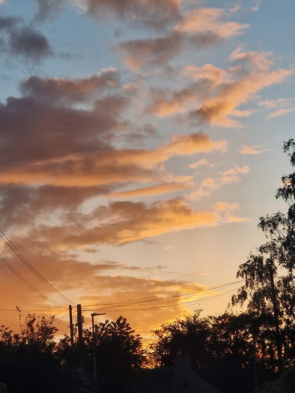 Colorful evening sky with striated clouds observed in Durham