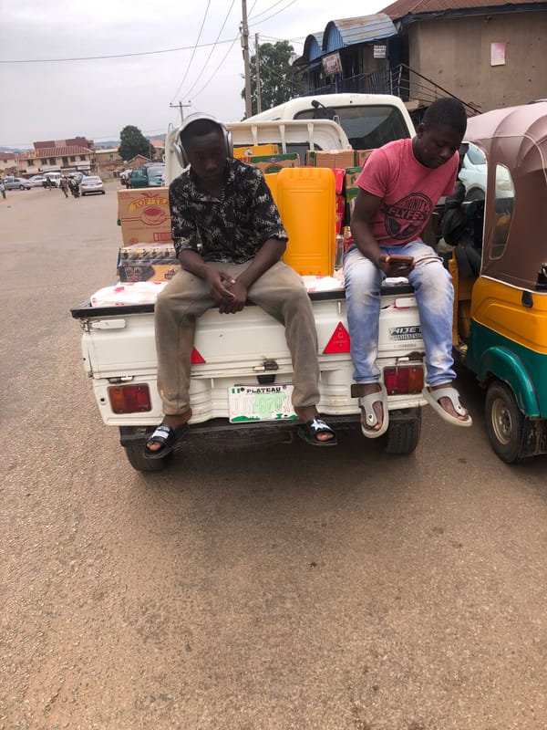 Midday street life and commerce across Jos, Nigeria