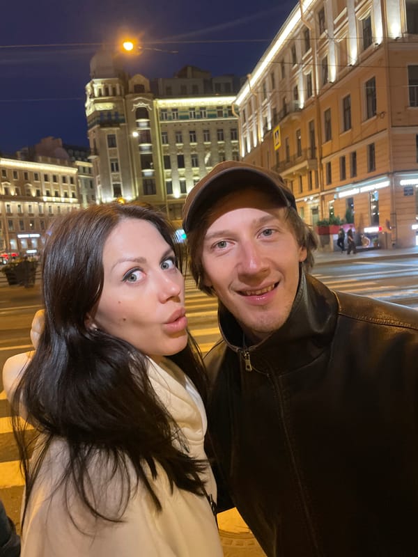 Couple Takes Nighttime Selfie on Saint Petersburg Crosswalk