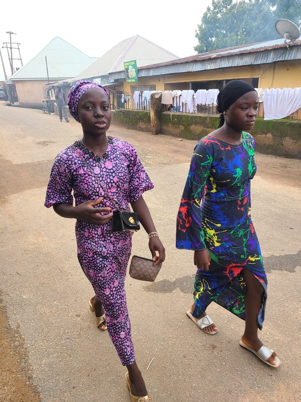 Morning foot traffic on the streets of Jos, Nigeria