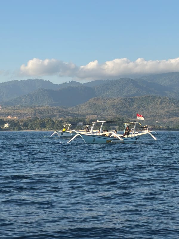 Jukung outrigger boats carrying tourists on Indonesian waters