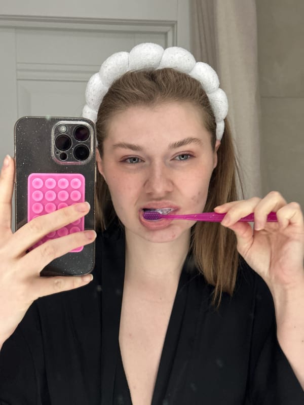 Woman takes mirror selfies at home in Kazan