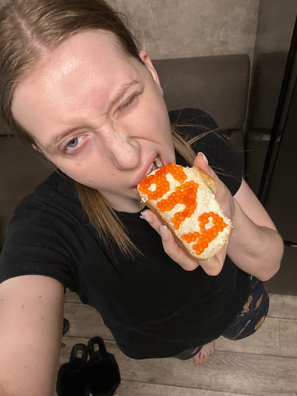 Women photographed with caviar bread in Chaikovsky, Russia