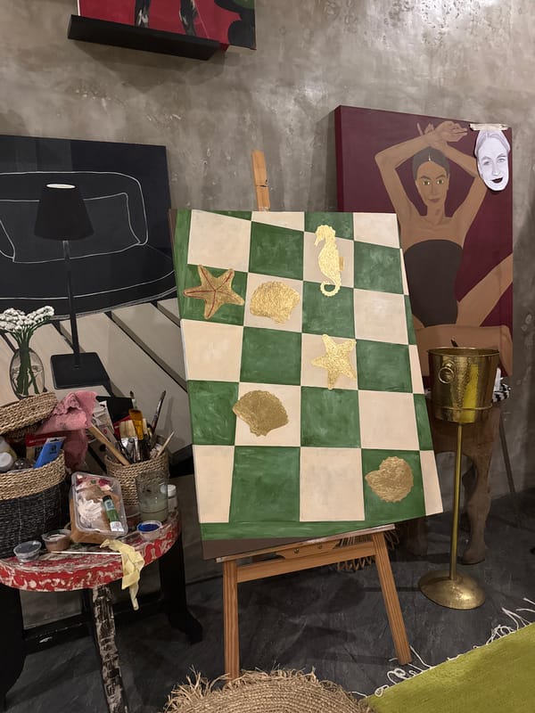 Artist workspace gathering with takeout food in North Kuta