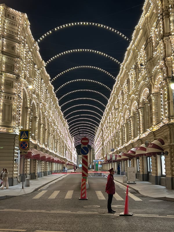 GUM department store glows under festive light canopies on Red Square