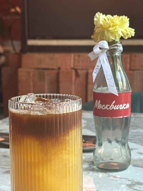Still life with bottle and flower observed in Novosibirsk
