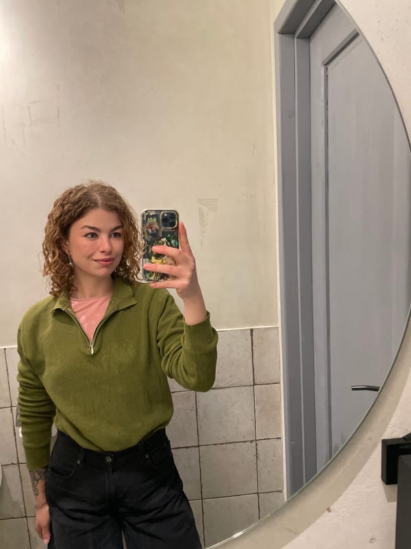 Woman enjoys sushi lunch with Georgian wine in Tbilisi