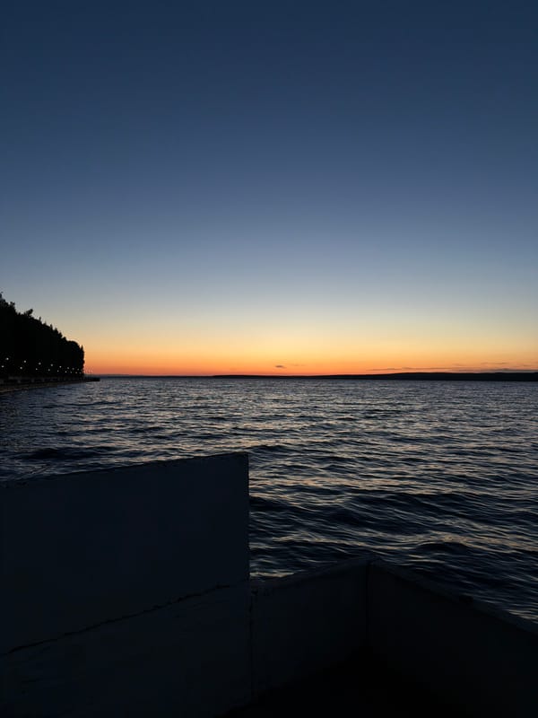 Evening waterfront sunset documented in Chaikovsky, Russia