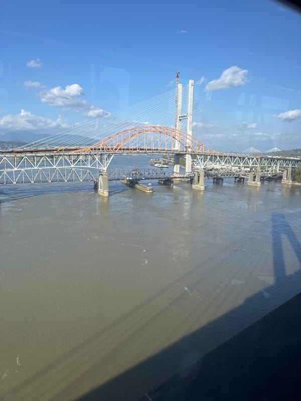 Bridge construction progress documented from aerial and ground perspectives
