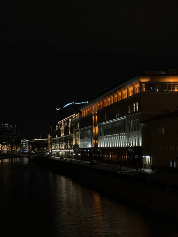 Nighttime Moscow riverfront buildings captured by witnesses