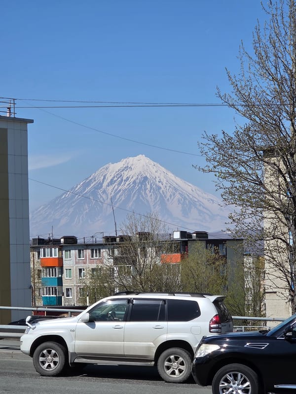 Clear skies frame snow-capped volcano in Petropavlovsk-Kamchatsky
