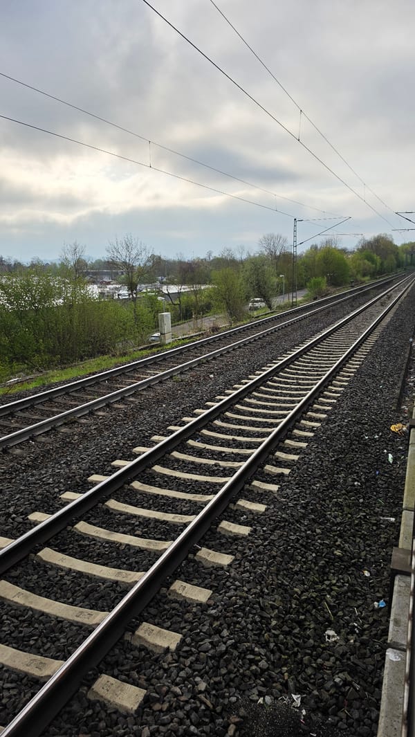 Morning railway tracks and coffee mug observed April 21