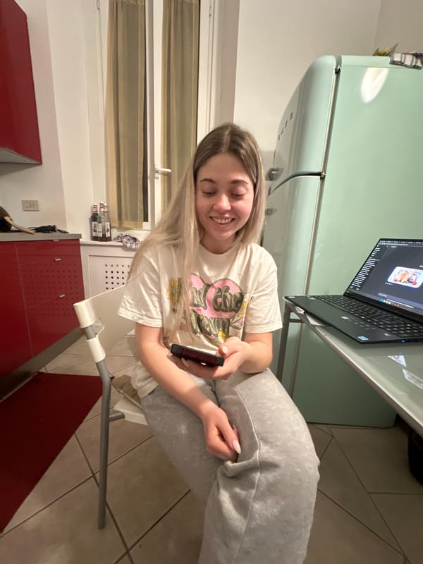 Woman smiling in Milan kitchen area Wednesday evening