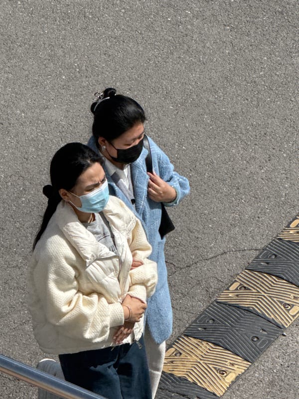 People gather on streets and pavement in Zhongtun, China
