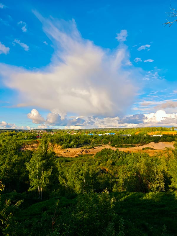 Landscape views documented in Dmitrov, Russia showing vegetation, quarry