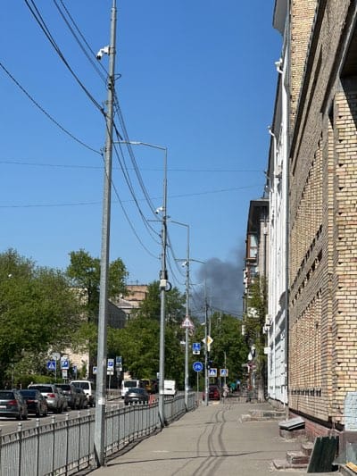 Dark smoke plume rises over Kyiv streets
