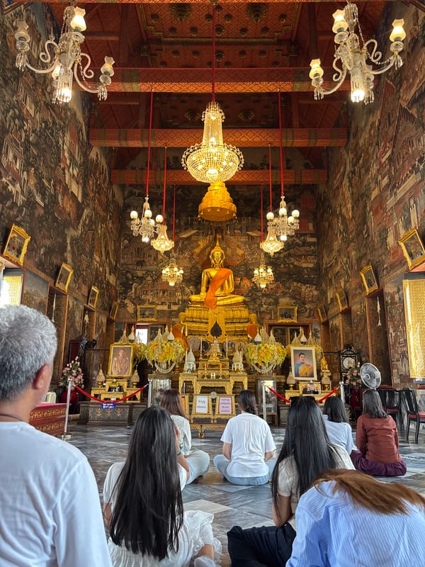 Morning prayers and temple visits documented in Bangkok